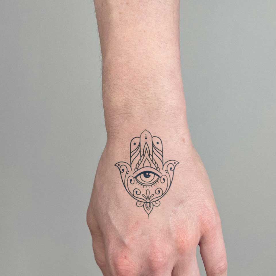 hand tattoo ideas for men - inkbolt