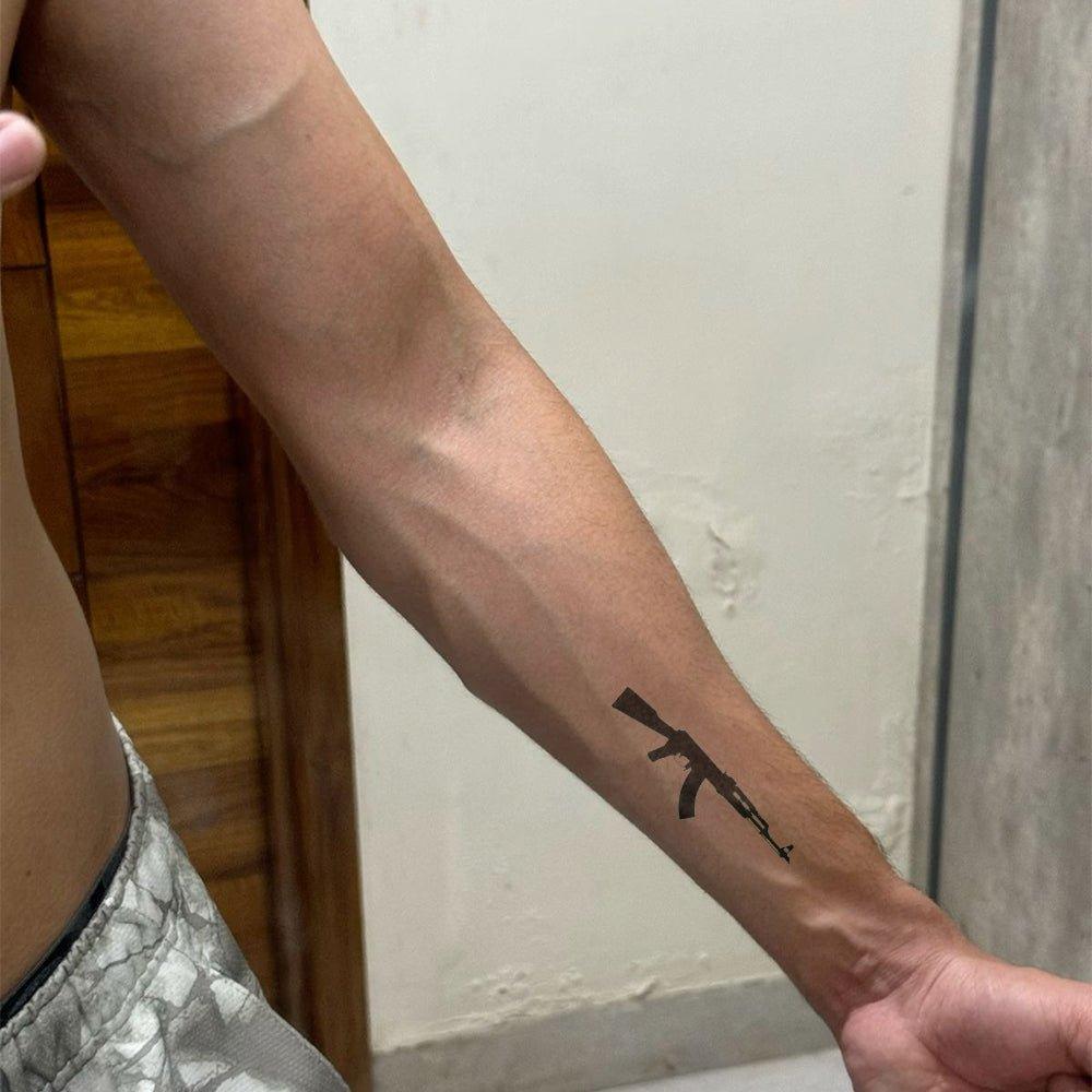 AK-47 Tattoo On Arm