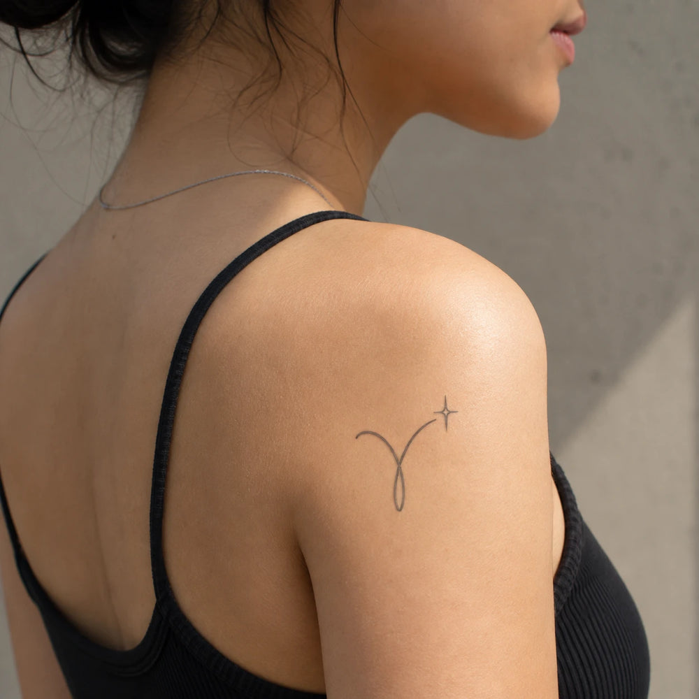 Aries Tattoo on girl Arm
