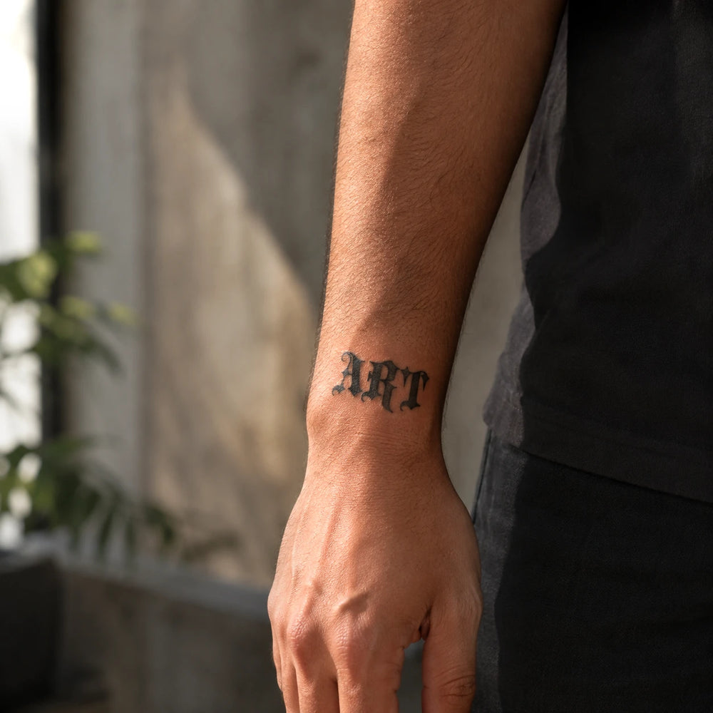 Art Tattoo On Man Wrist