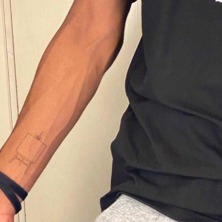 Artboard Tattoo on arm