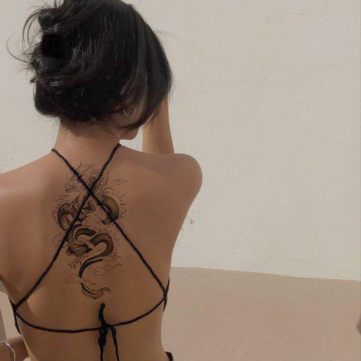 Asian Dragon with Clouds tattoo on women back