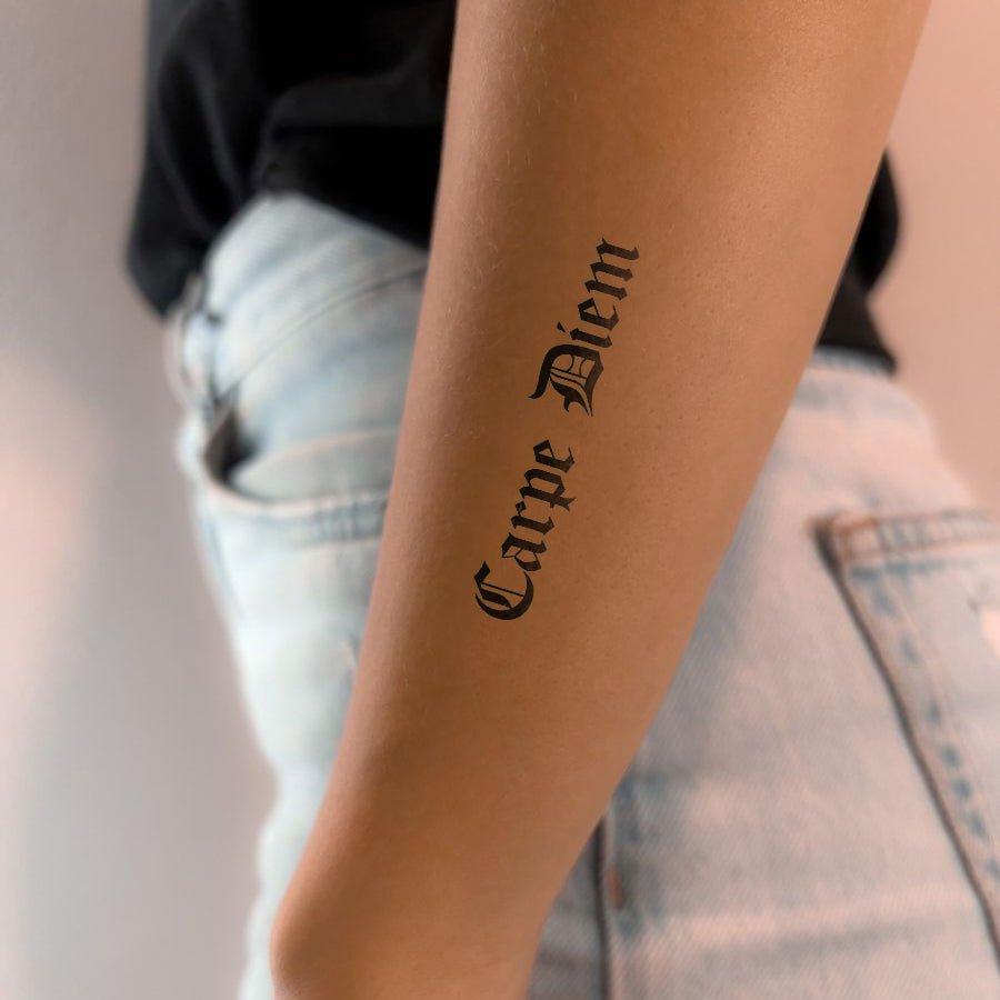 Carpe Diem tattoo on hand
