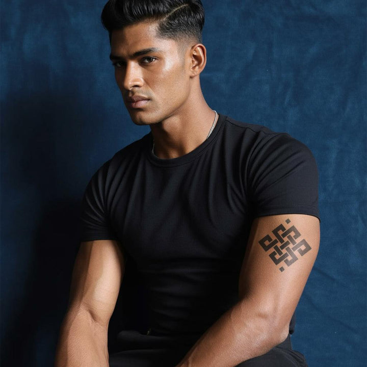 Celtic Knot Tattoo On Man Arm
