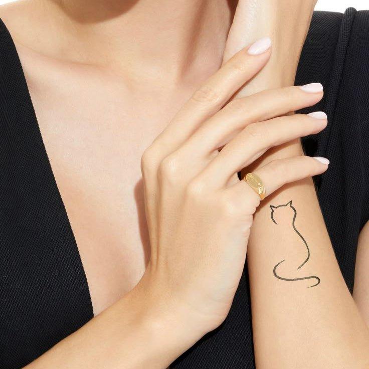 Curled Cat Silhouette Tattoo On Hand
