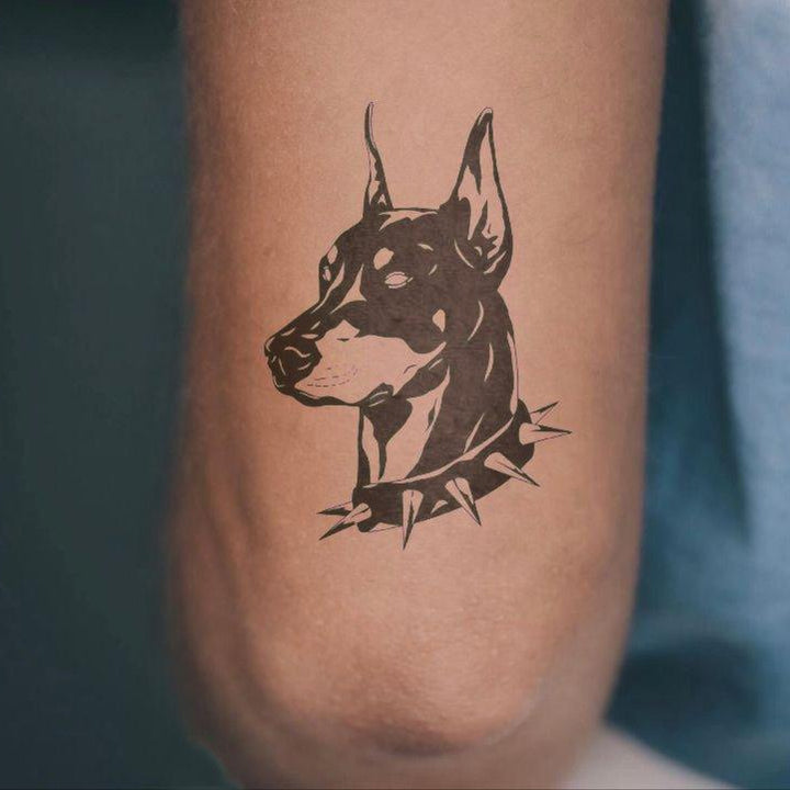 Doberman tattoo on hand