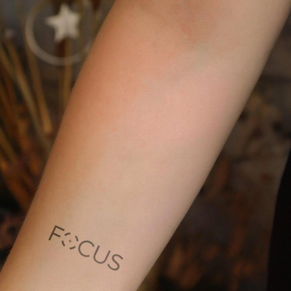 Focus Tattoo On Arm
