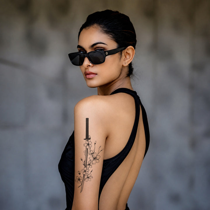 Katana with Cherry Blossoms Tattoo on Arm