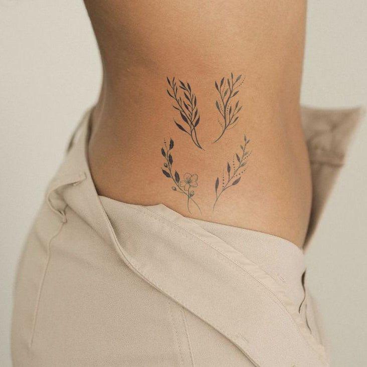 Leaves of Luck Tattoo on waist