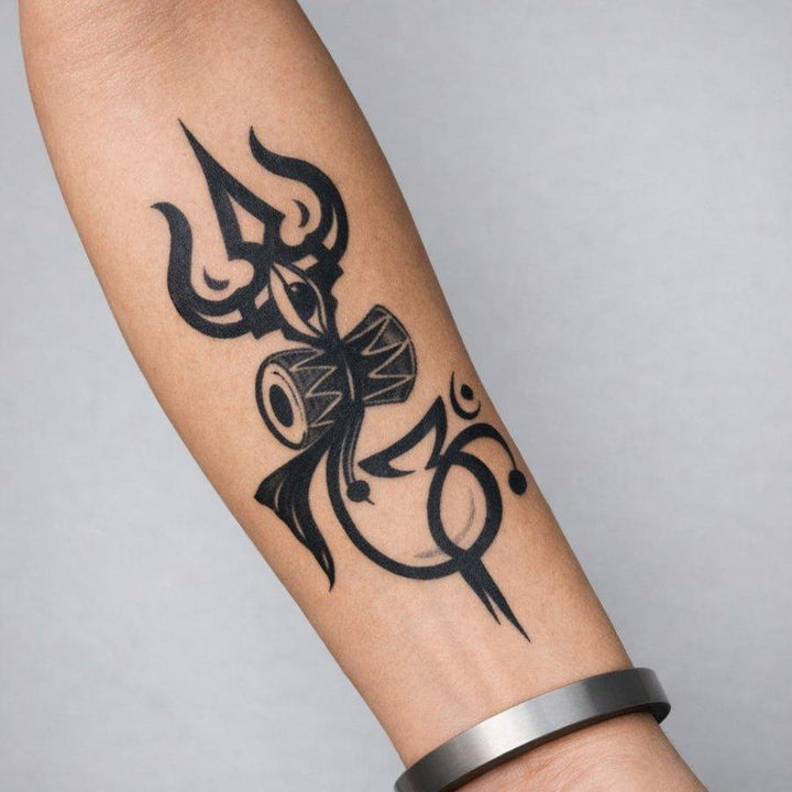 Lord Shiva's Damru Trishul tattoo on hand