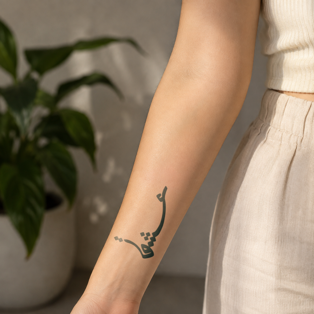Love-Ensh Tattoo on a womans hand