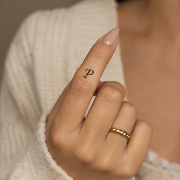 P Letter Tattoo on hand