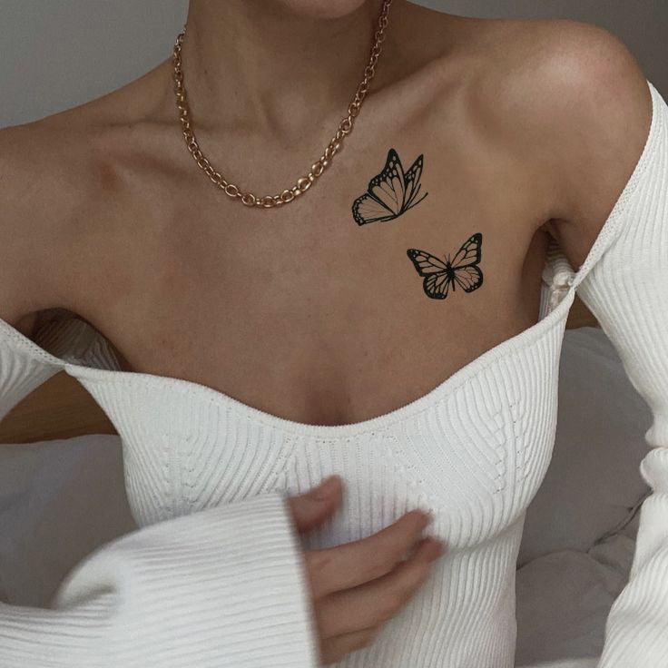 Soaring Butterflies Tattoo on Chest