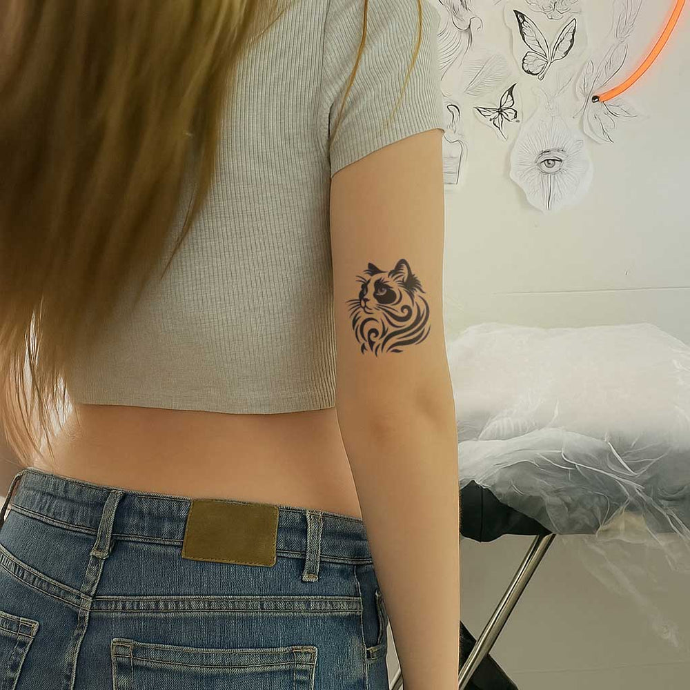 Tribal Cat Tattoo on arm