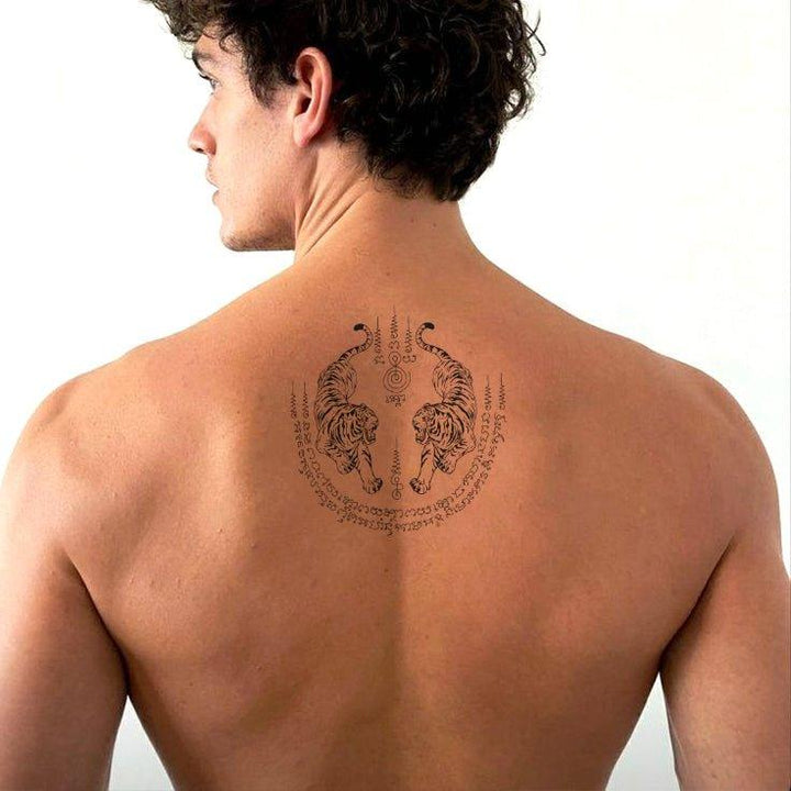 Twin Tigers tattoo on man back