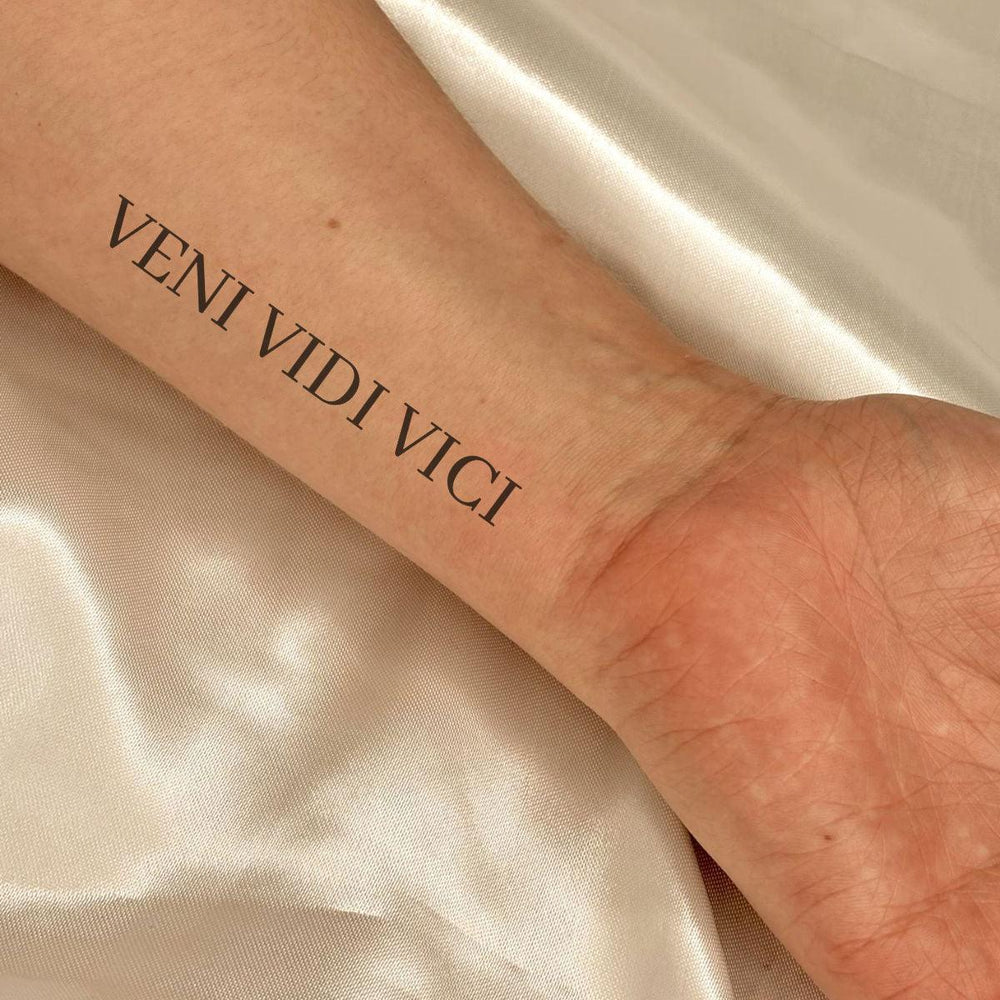 Veni Vidi Vici tattoo on arm