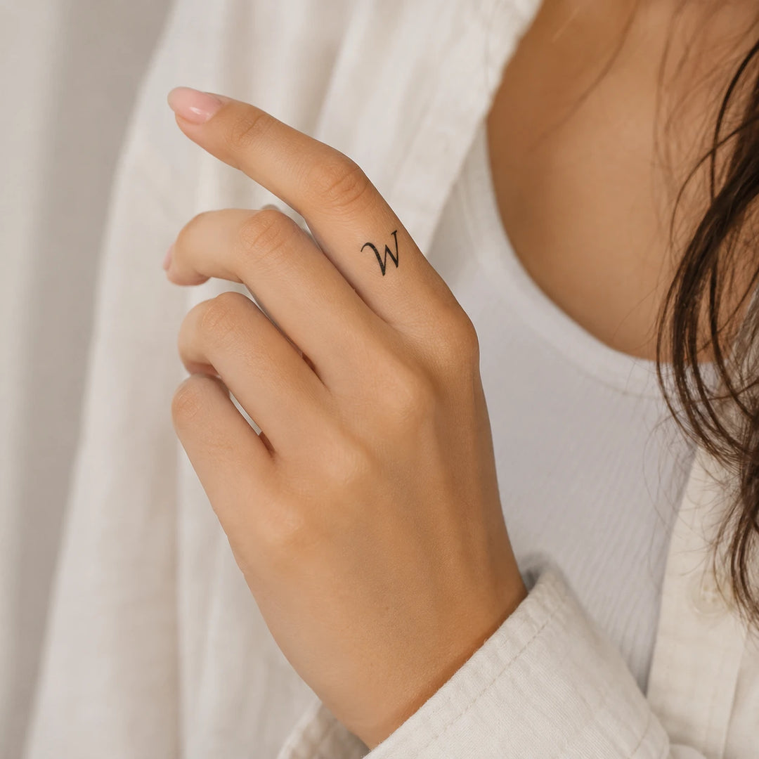 W Letter Tattoo On Hand