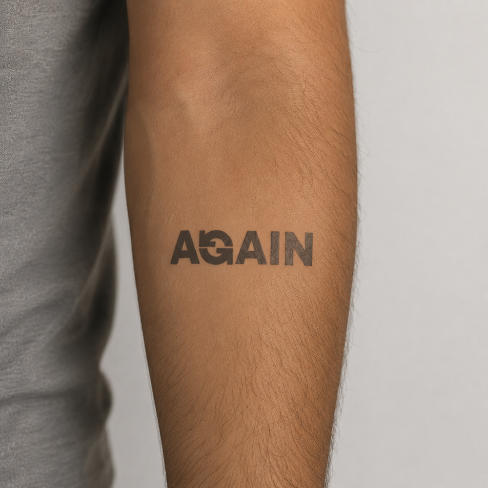 again Tattoo on man arm