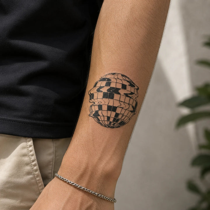 disco ball tatoo on hand