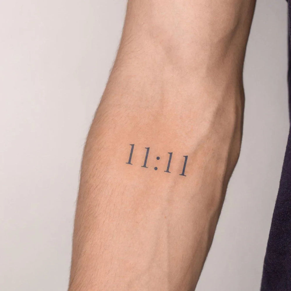11:11 tattoo on arm