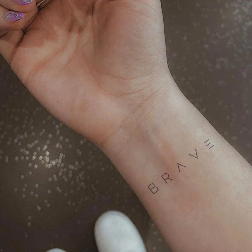 Brave tattoo on wrist