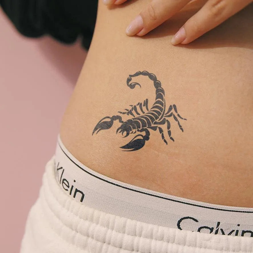 Scorpion Tattoo on girl waist