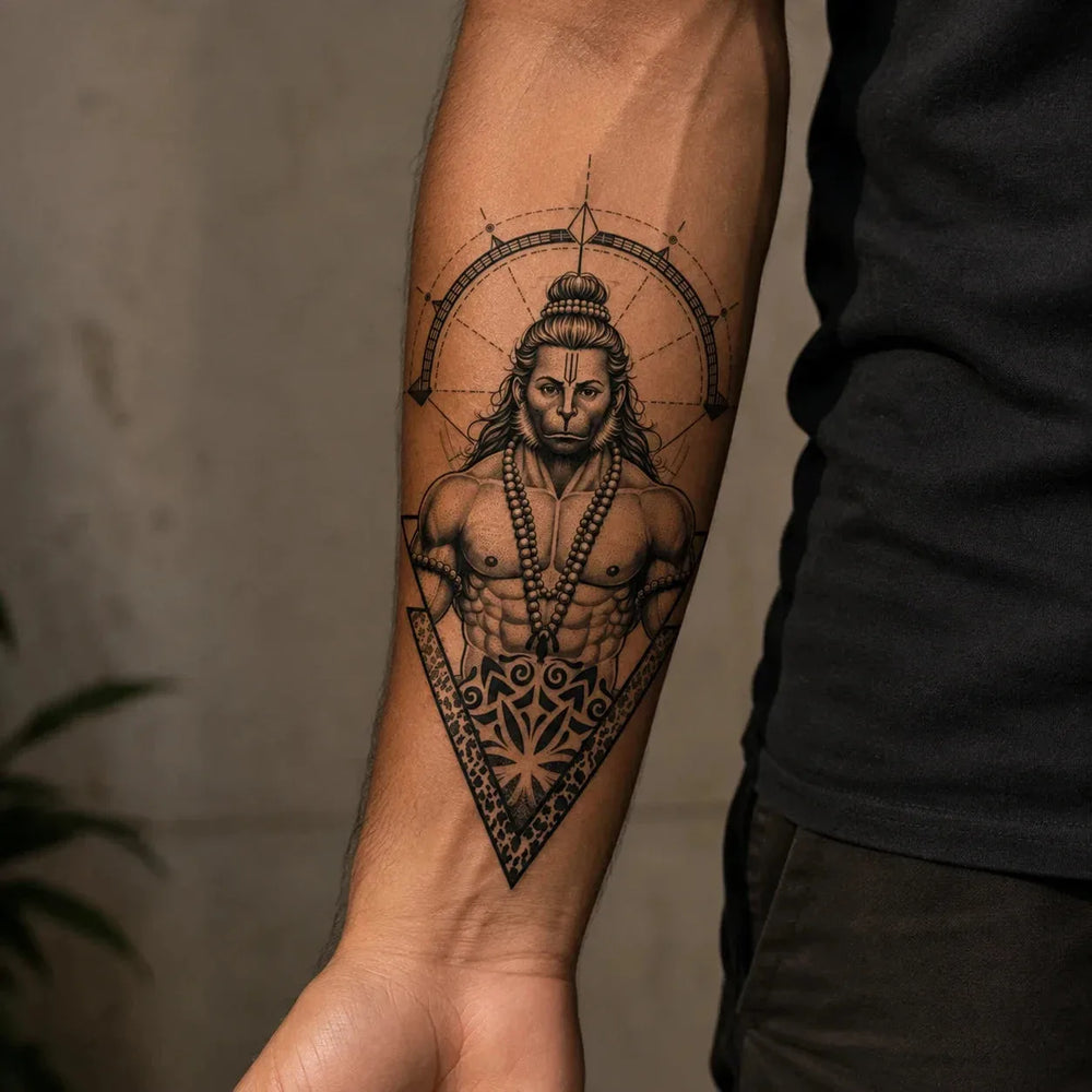 mahaveer tattoo on man's arm