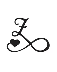 Signature Heart Initial Tattoo